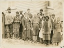 Image of Eskimos [Inuit], Moravians, and Dr. Fernald in front of MacMillans dental clinic of the